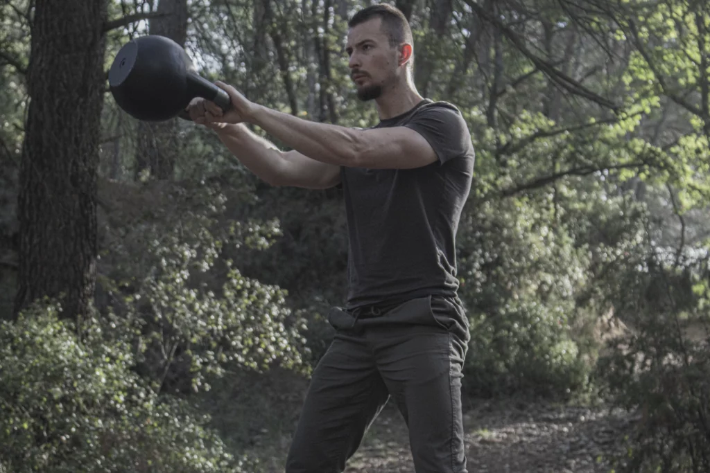 Kettlebell swing with a 12-32kg adjustable kettlebell